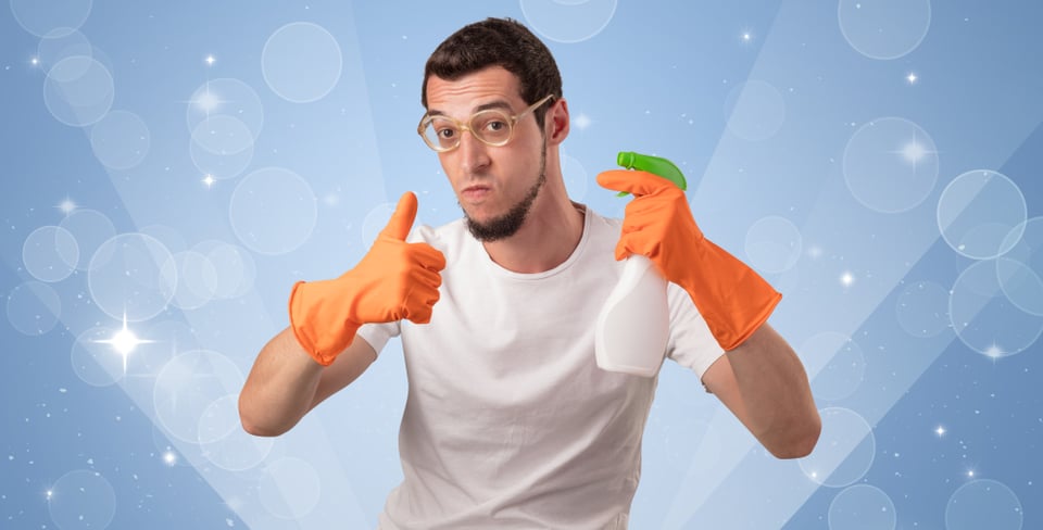 Glittered-blue-background-with-male-housekeeper-and-cleaning-equipment