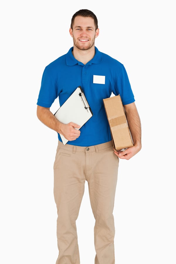 DIY cleaning Smiling young salesman with packet and clipboard against a white background